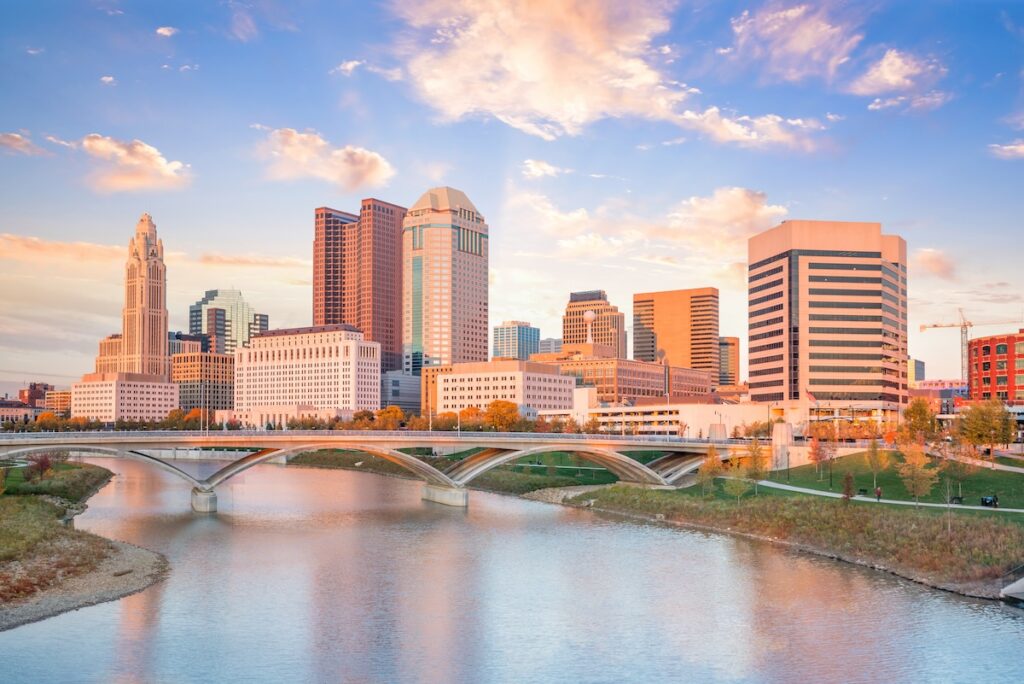 Columbus, Ohio skyline on water.