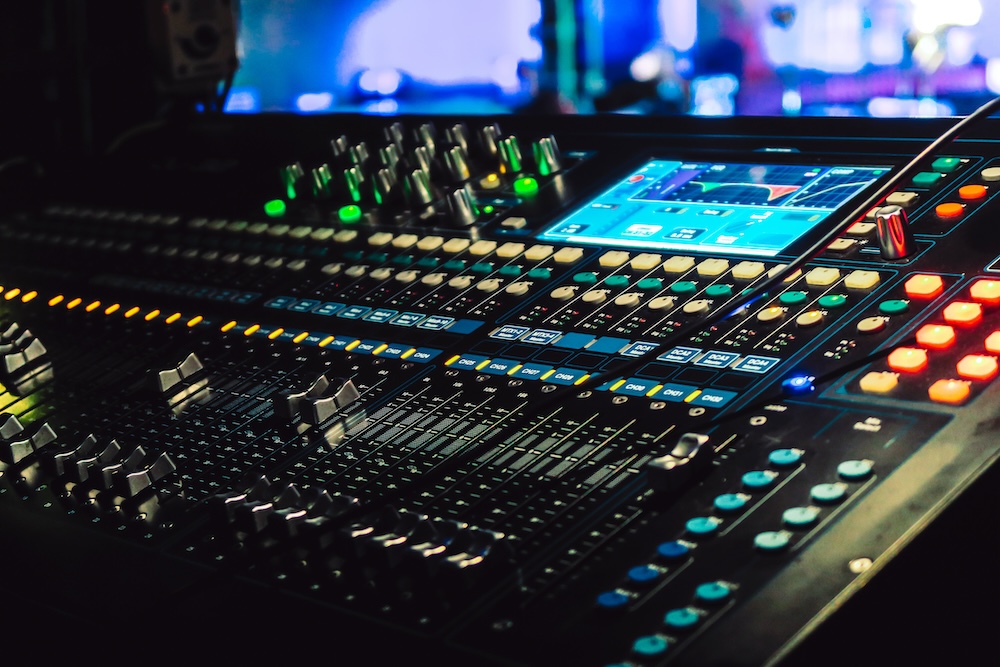 Closeup of an audio mixing control panel