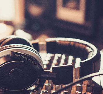 A Headphones Set on an Audio Control Station