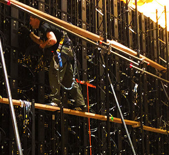 Men Working on Installing a Led Wall Technology